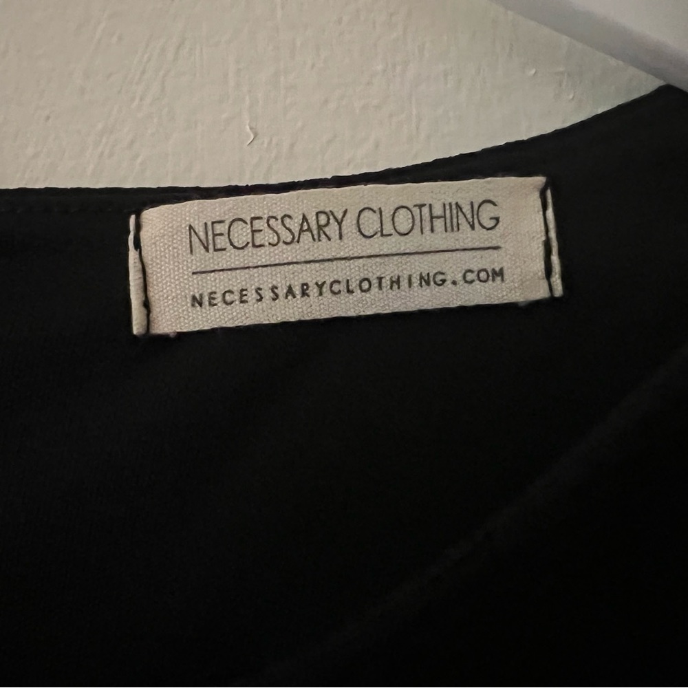 Black dress with white trim. - Picture 4 of 5